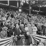 President Harry Truman preparing to throw out the ceremonial first pitch at a game between the Washington Senators and New York Yankees on Opening Day, 1951. (Abbie Rowe/National Park Service)