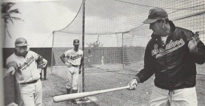 Jim French watching Ted Williams give batting instructions during spring training, 1969, at Pompano Beach, Florida.