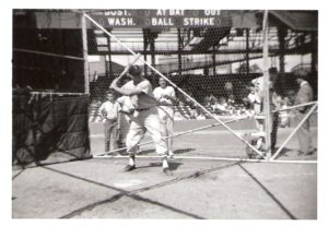 Jackie Jensen, Red Sox Right Fielder in Batting Cage, Bob Farmer & Denny MacDougal looking on.
